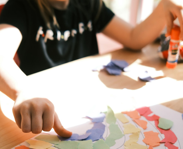 child doing arts and craft activity